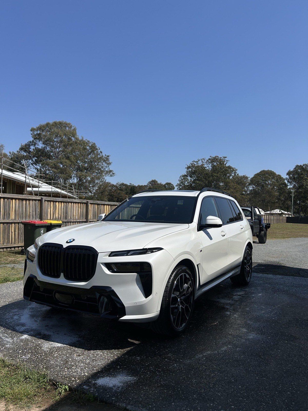 BMW X7 mid-detail in driveway