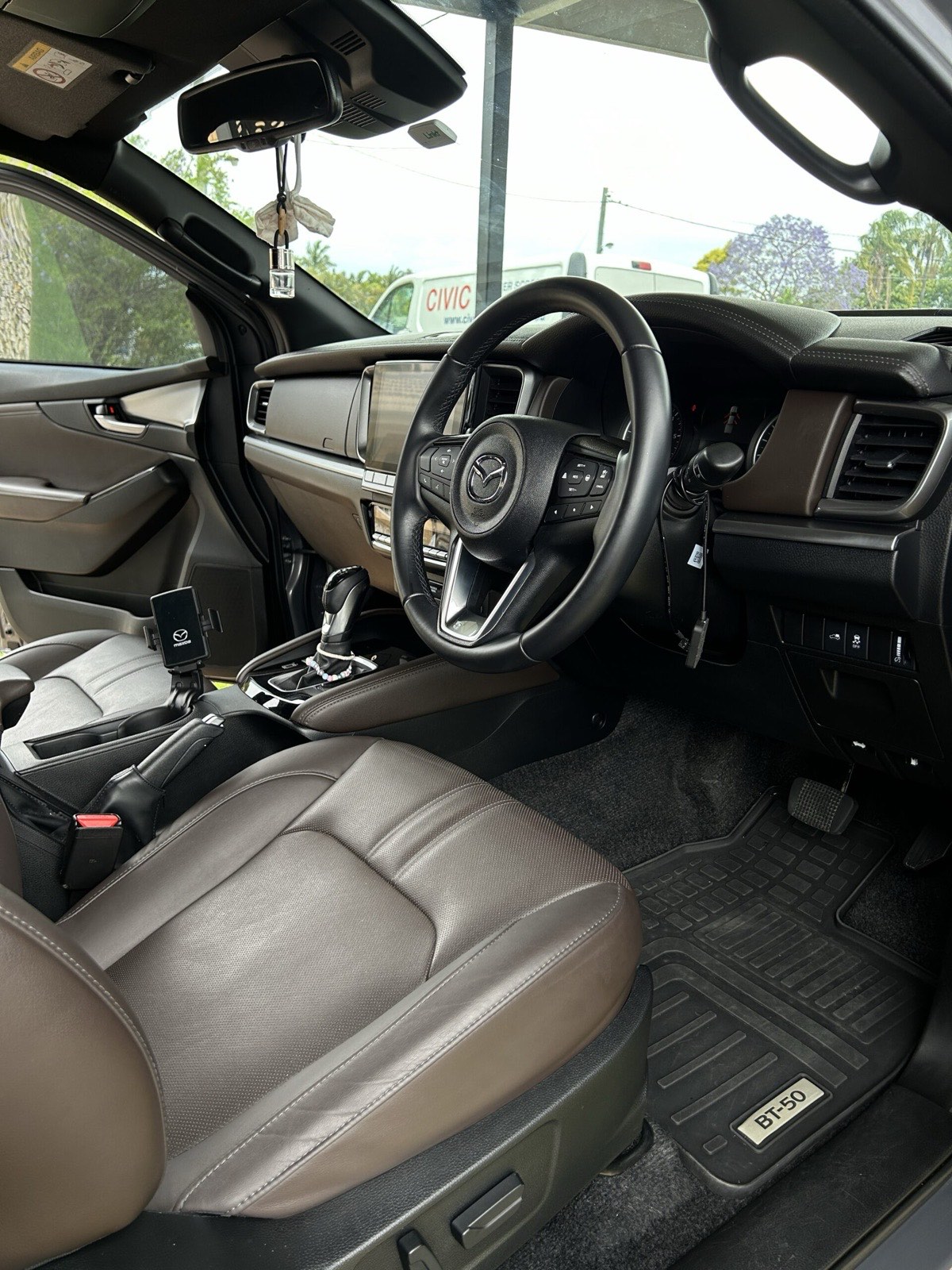 Mazda BT-50 ute interior with detailed leather and floor mats